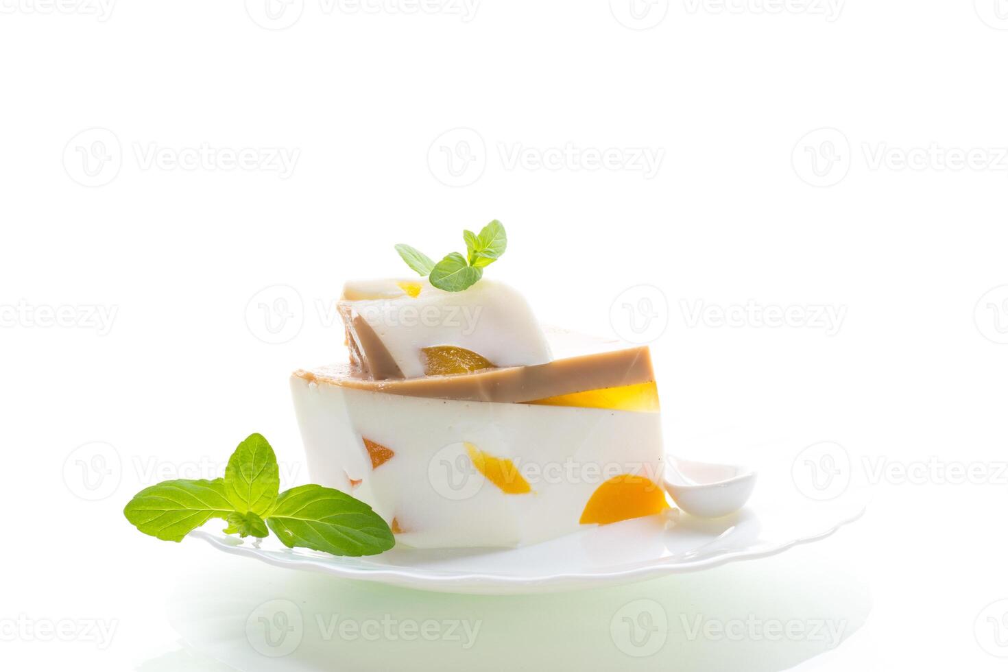 peach pieces inside milk fruit jelly photo