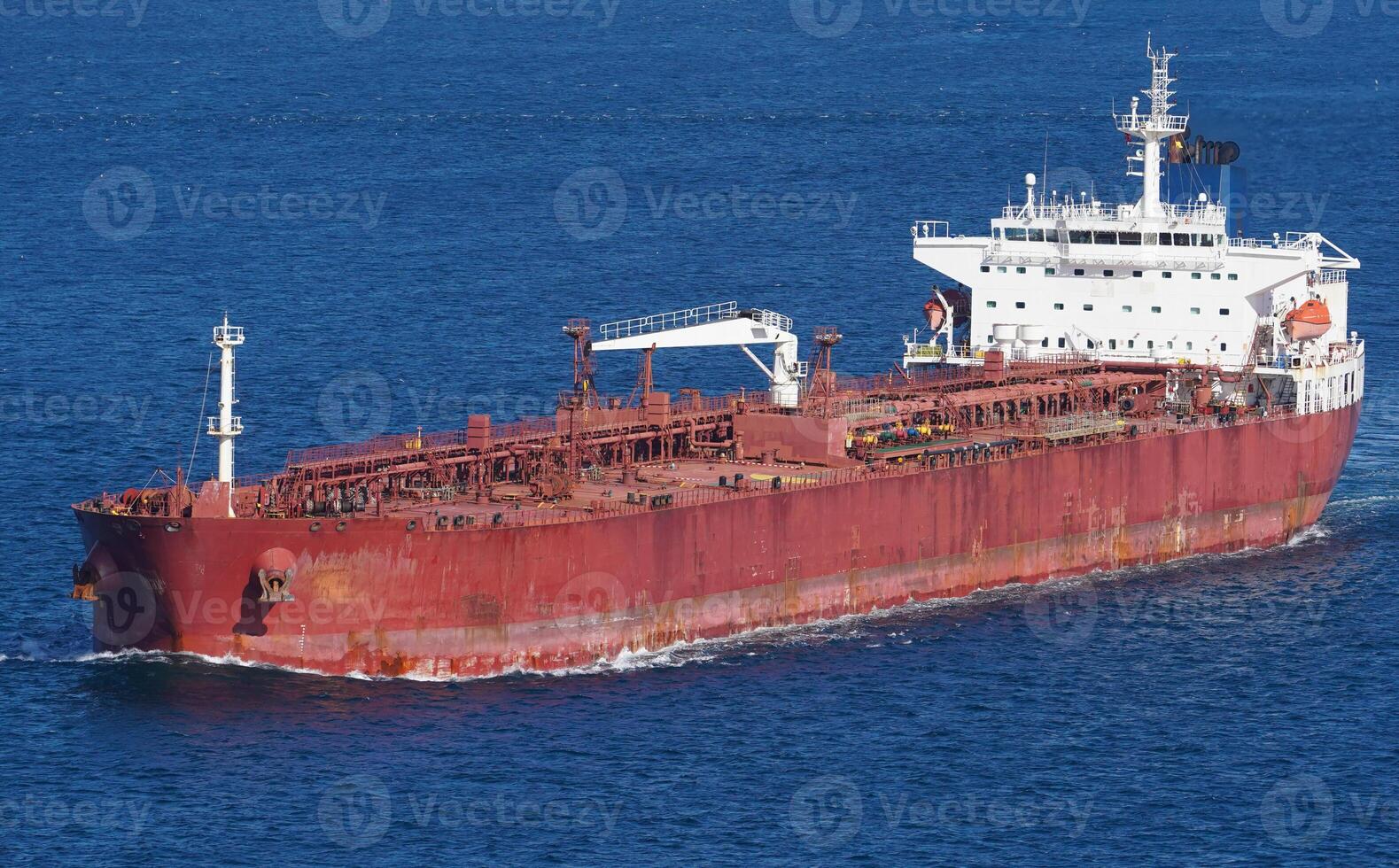 Red Big Tanker Ship in sea photo
