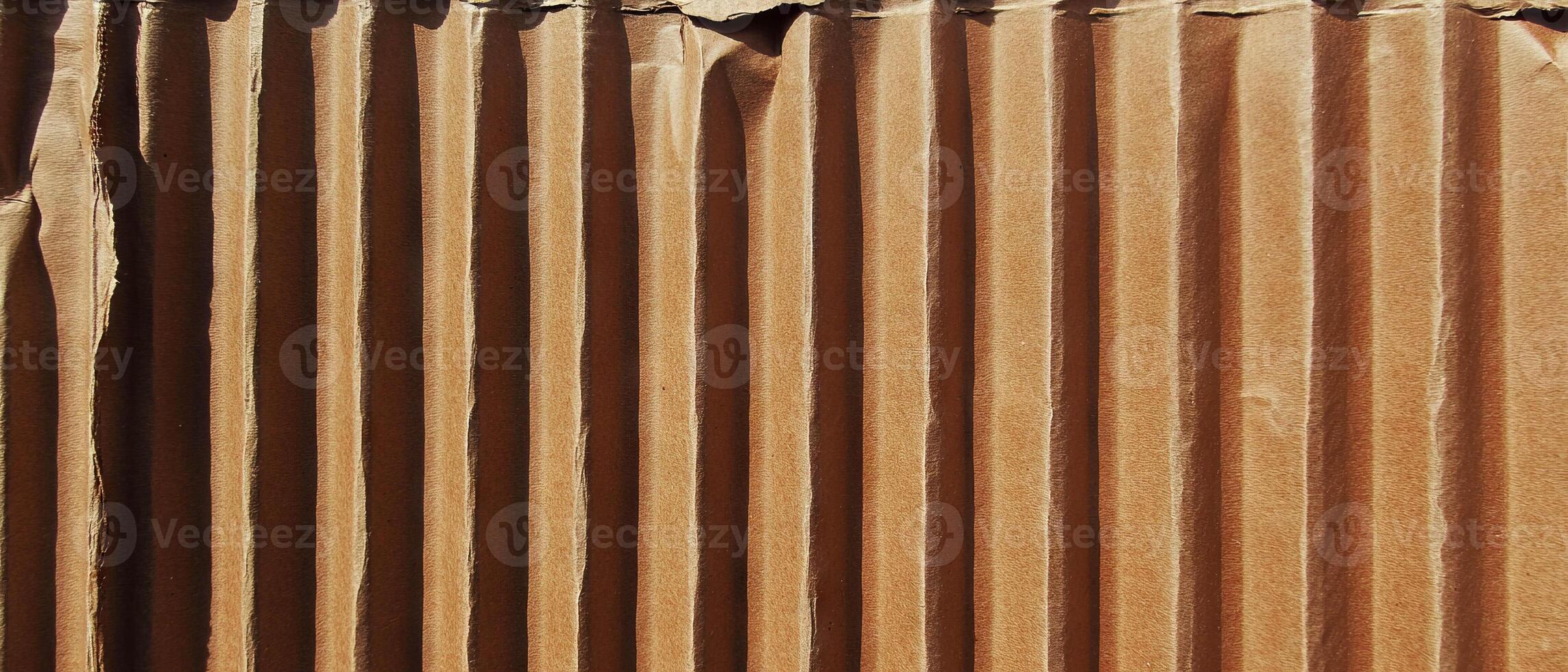 Corrugated cardboard texture showcasing ridged design and sturdy structure for various uses photo