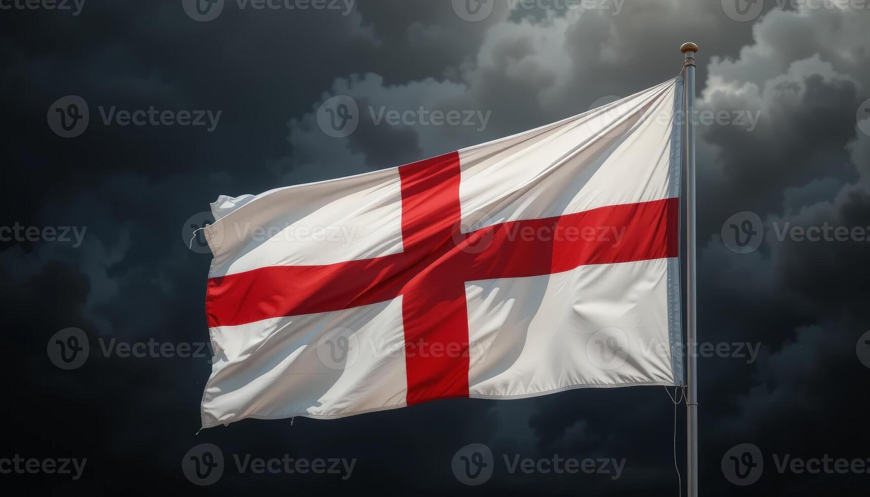 The flag of England flies amid dark clouds, showcasing its bold red cross against a white background, representing national pride and identity. photo
