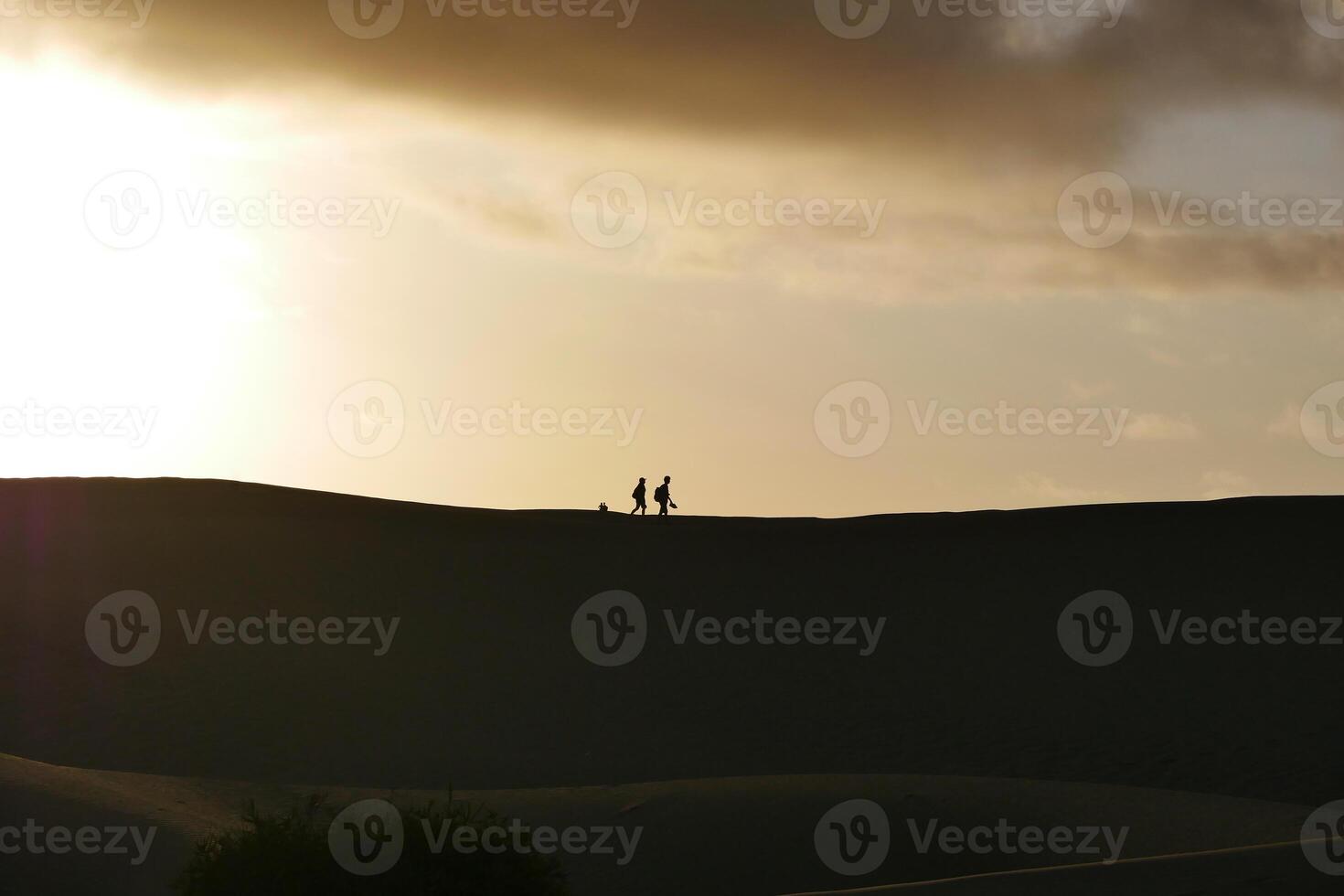 A colorful sunset in a Maspalomas dune, Gran Canaria island photo