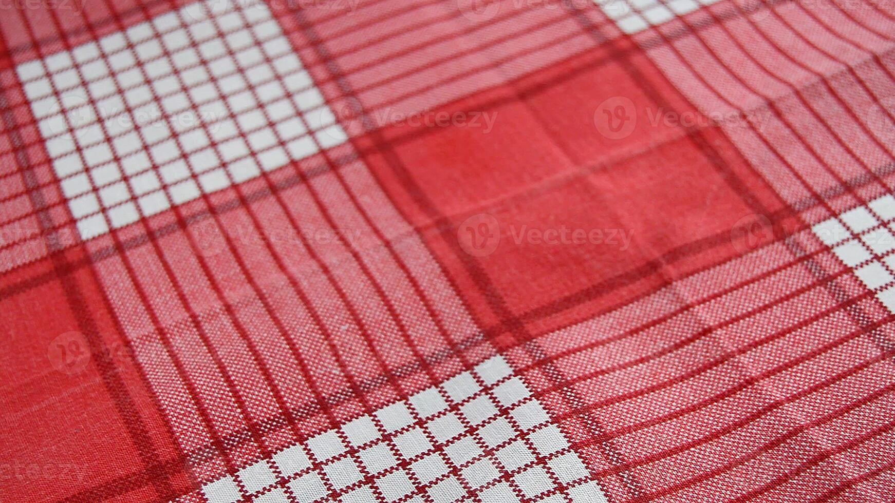 A close up of a red and white checkered fabric photo