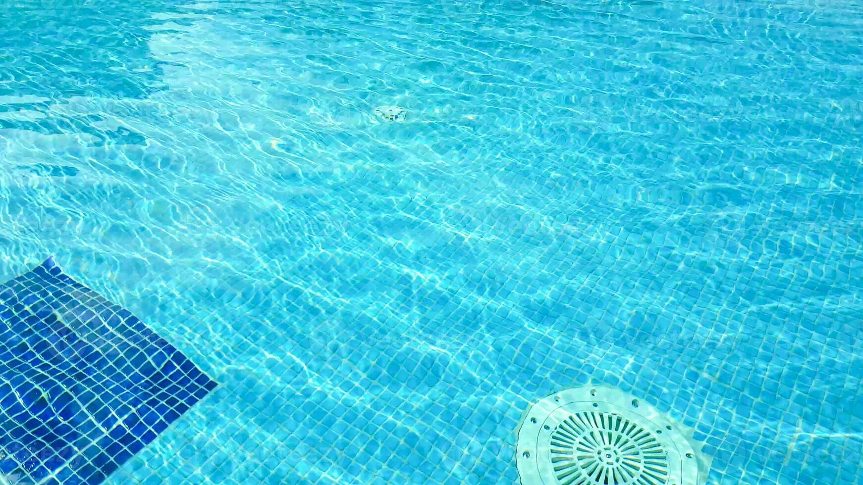 A pool with a sun umbrella photo