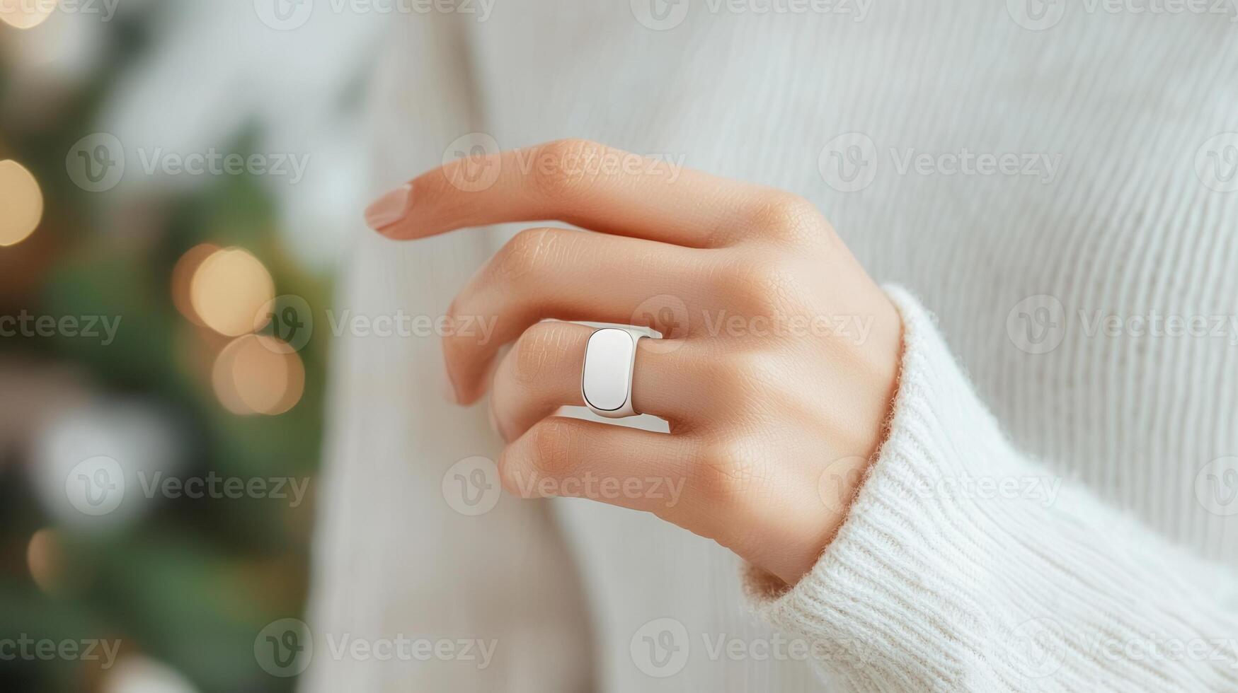 a wearing Woman smart ring, a wearable technology device, showcasing its sleek design and potential for connectivity photo