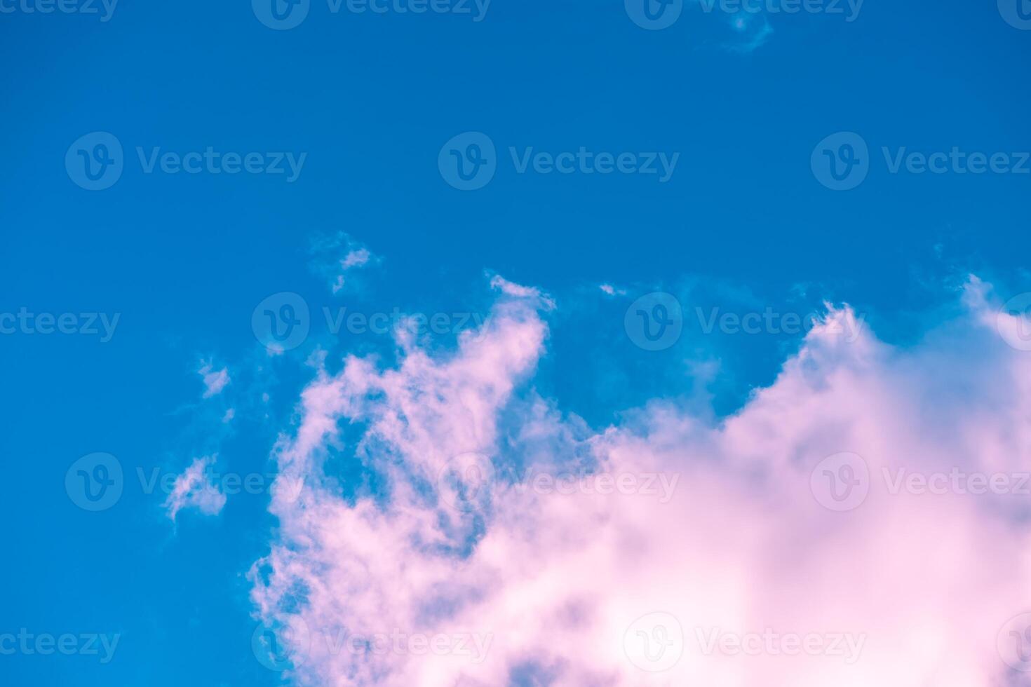 natural background, Pink clouds softly across a vibrant blue sky create a dreamy, ethereal atmosphere, ideal for backgrounds and designs that evoke tranquility and beauty in nature photo