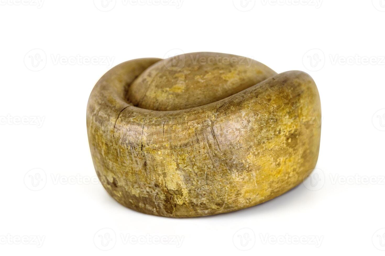Antique millinery form for shaping pillbox hats. Vintage wooden block used in hat making. Craftsmanship, old professions, artisan work concept. Isolated on white background. Copy space 04 photo