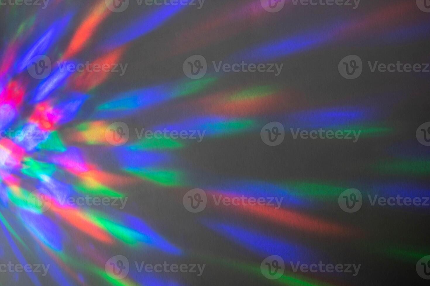 Beautiful multicolored geometric patterns on a dark background photo