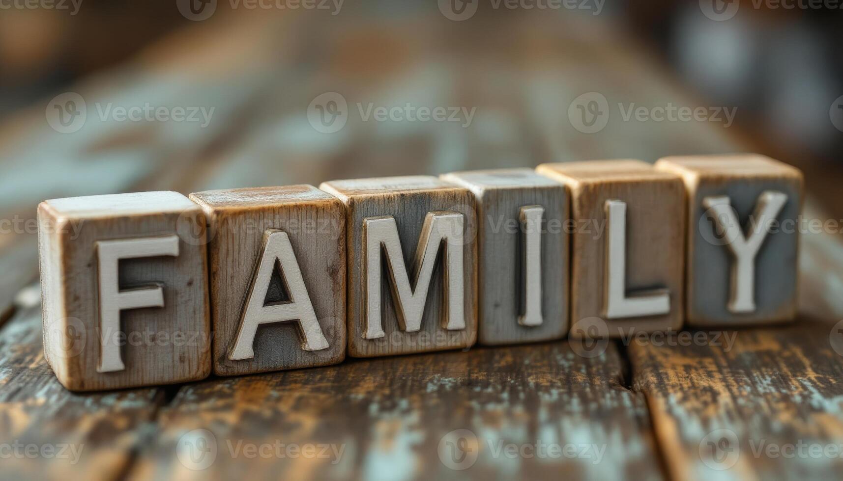 Rustic wooden sign with individual blocks spelling FAMILY on a textured table showing wood grain photo