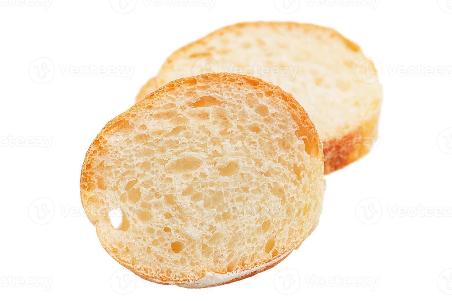 Two pieces of bread isolated. Slices of baguette isolated on white. photo