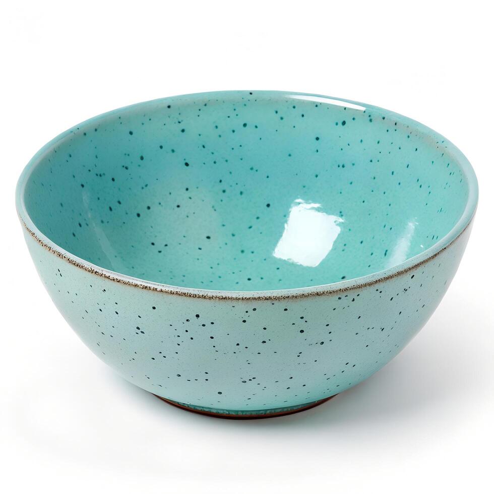 Turquoise Speckled Glazed Ceramic Bowl with Rustic Rim on White Background Still Life photo