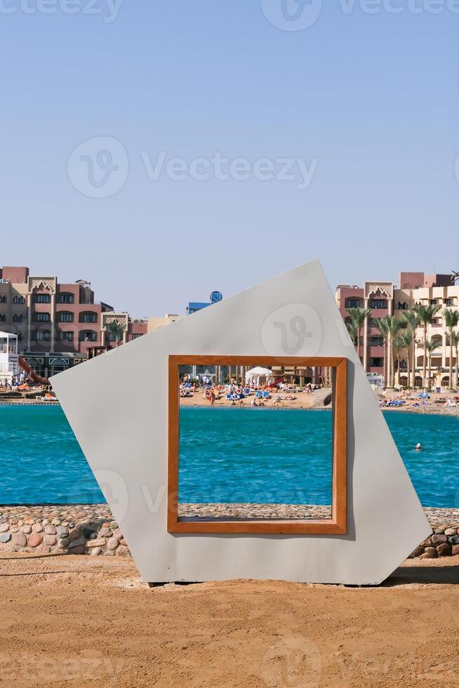 A large white building with a window in the middle of it photo