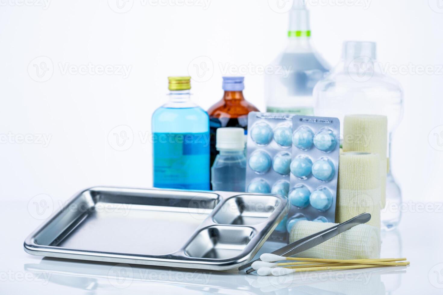 Medical equipment for treating infections. Wound care dressing set. Medical supplies for nurses. Conform bandage, forceps, cotton stick, alcohol. Sterile dressing materials. Healthcare photo