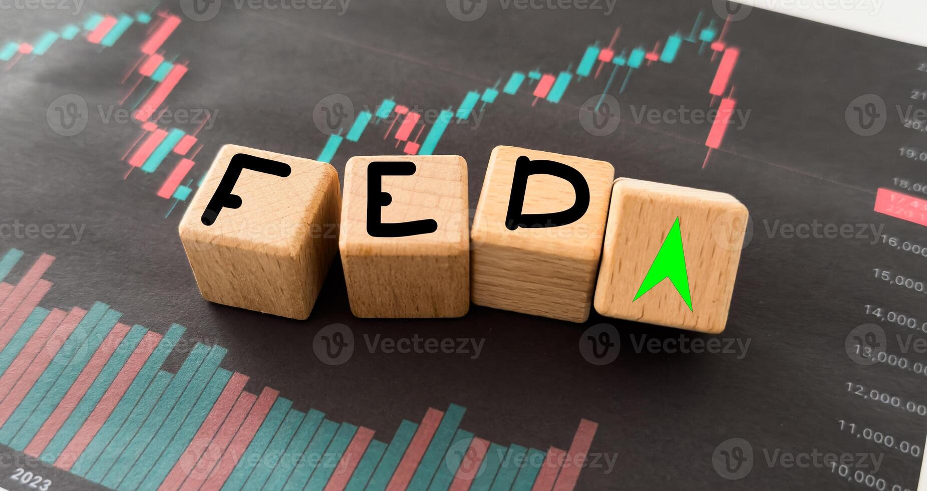 FED wording with up and down arrow on USD dollar banknote for Federal reserve increase and decrease interest rate control which effect to America and world economic growth concept. photo