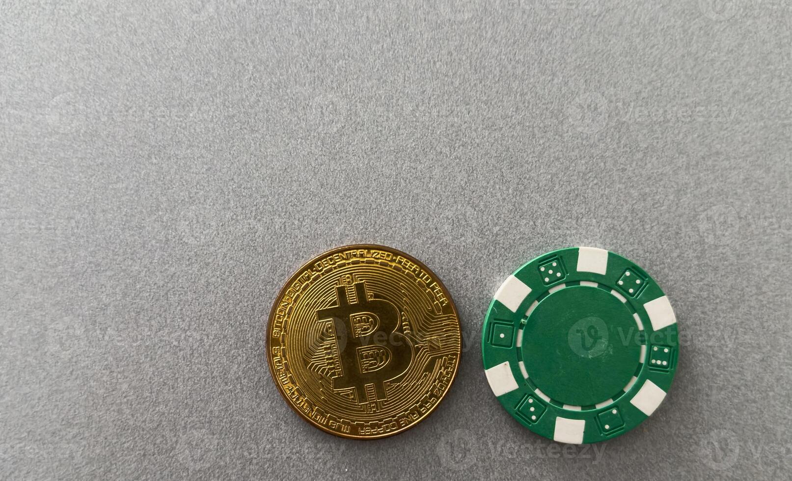Bitcoin coins with poker cards and chips photo