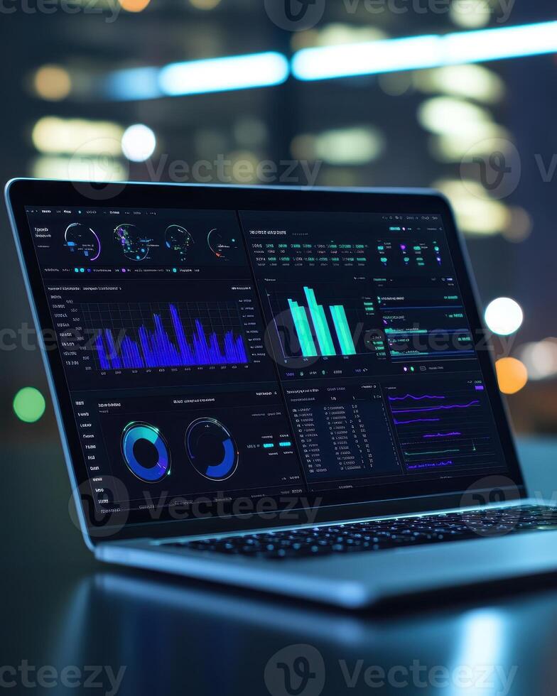 A laptop displaying data analytics and visualizations in a dark, modern environment photo