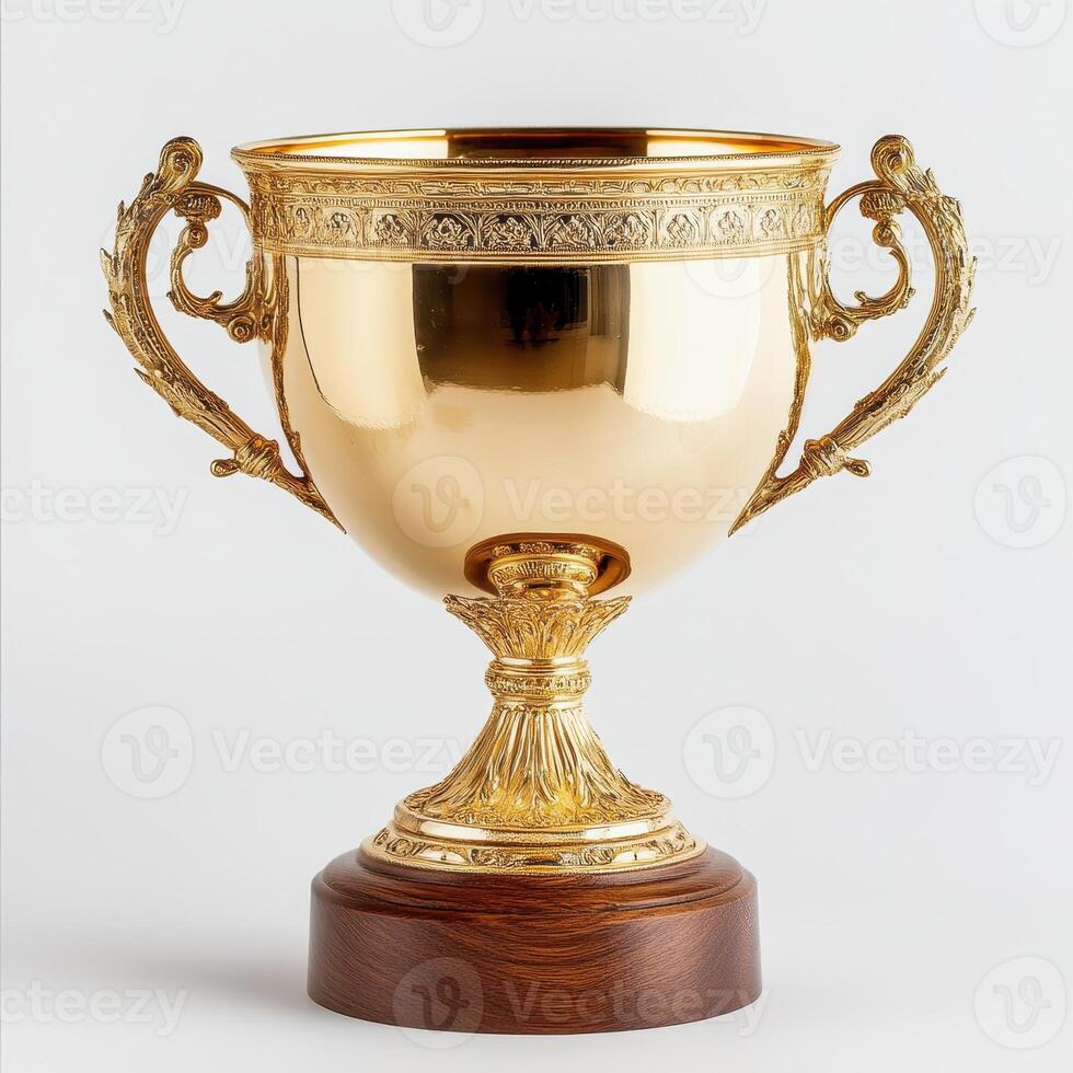 A shiny golden trophy with ornate handles, symbolizing achievement and victory photo