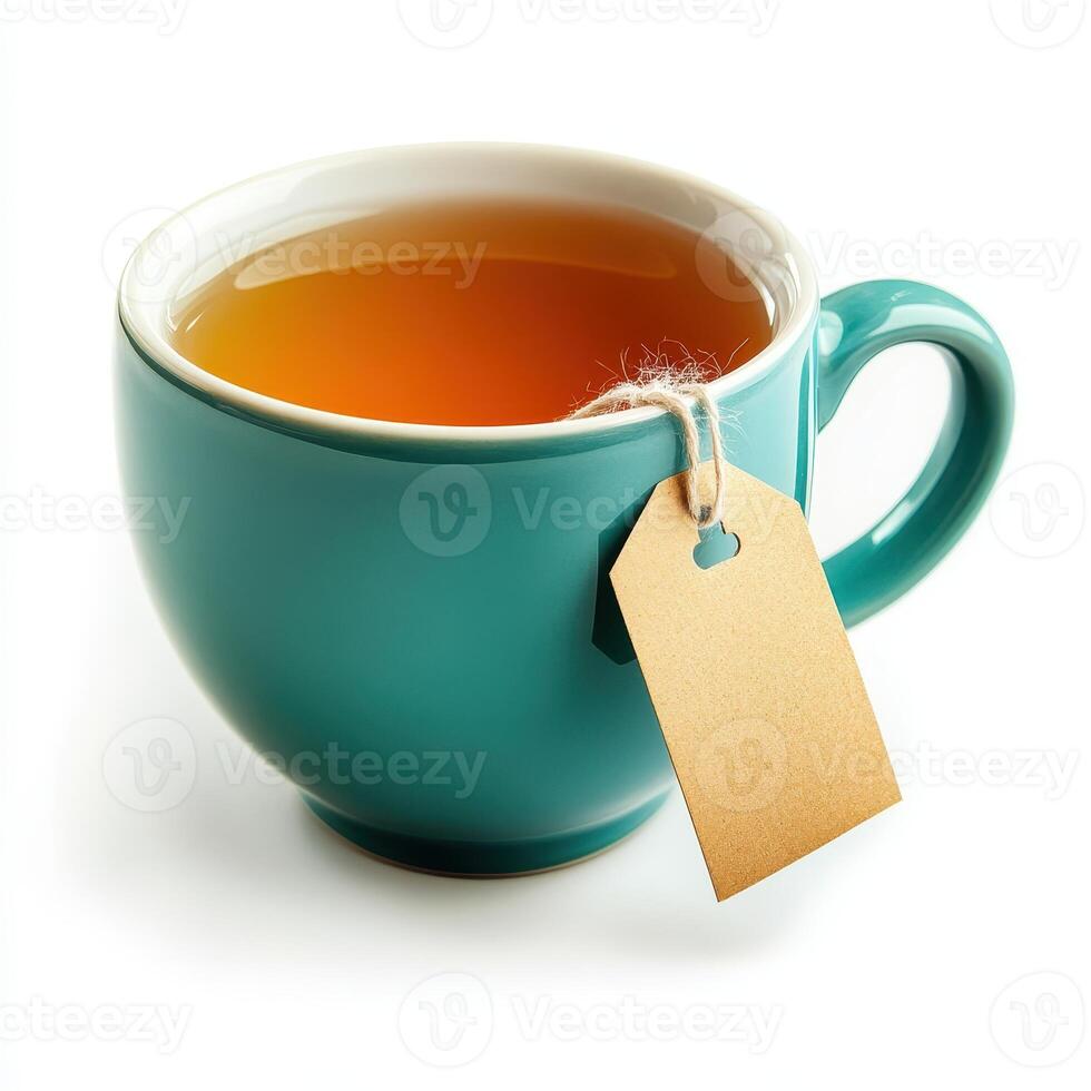 A turquoise cup filled with tea and a blank tag attached. photo