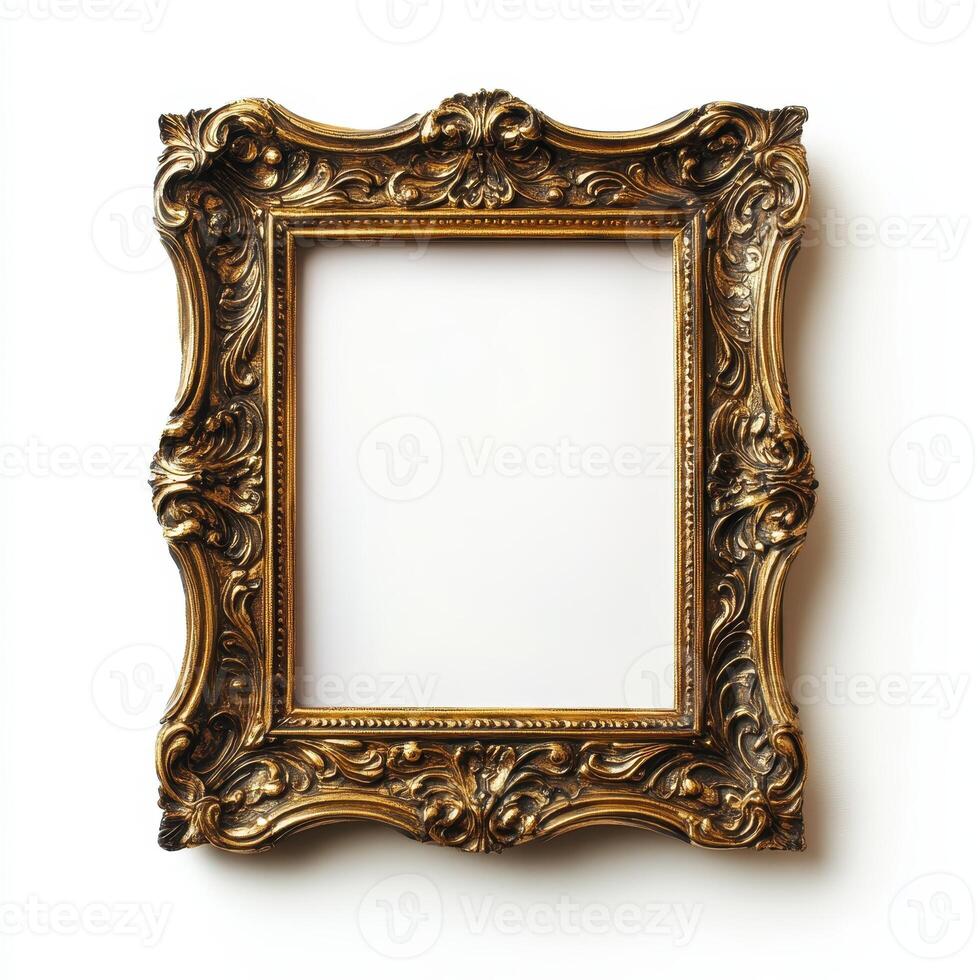 An ornate gold picture frame with intricate designs, empty for artwork or photographs. photo