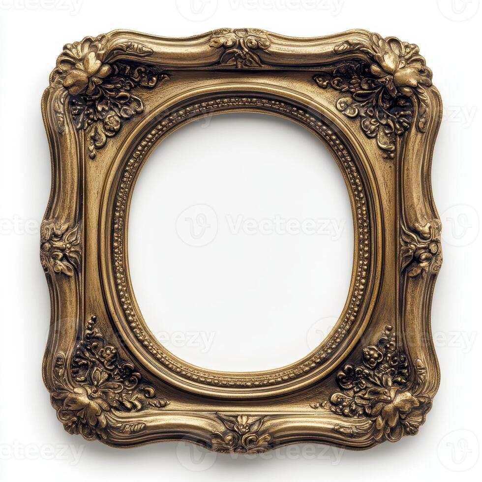 An ornate, vintage-style picture frame with floral designs, empty for artwork display. photo