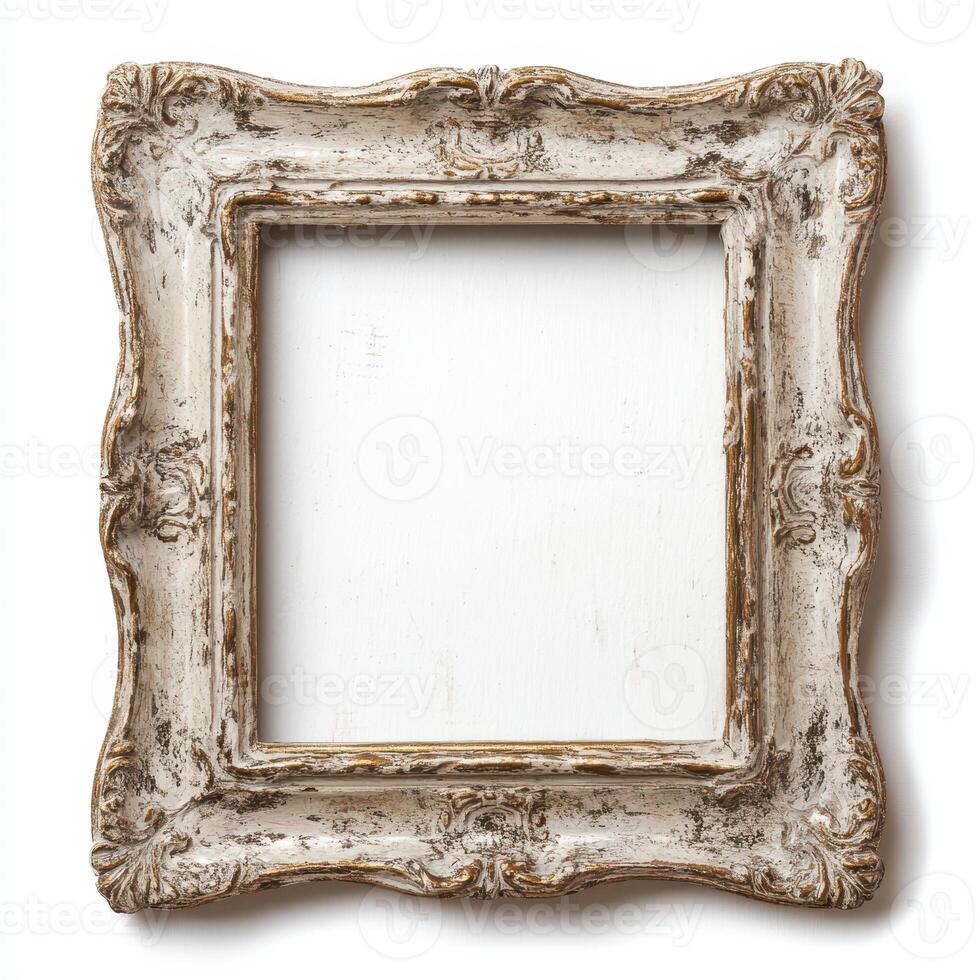 An ornate, vintage picture frame with a distressed finish, empty and ready for artwork. photo