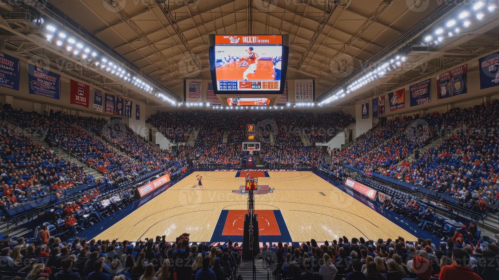 A vibrant indoor basketball arena filled with fans, showcasing a game in progress. photo