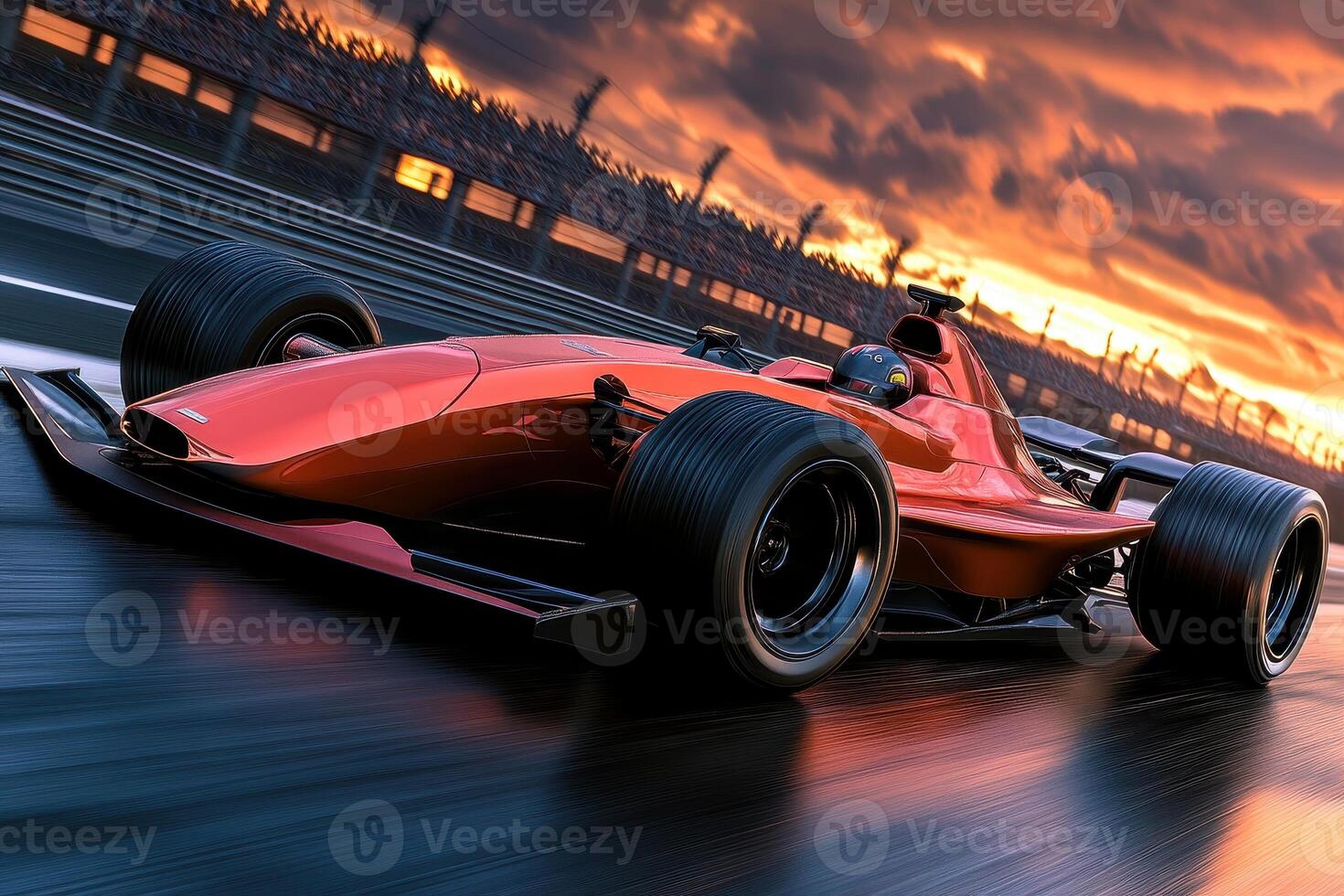 A sleek red racing car on a track during sunset, showcasing speed and performance photo