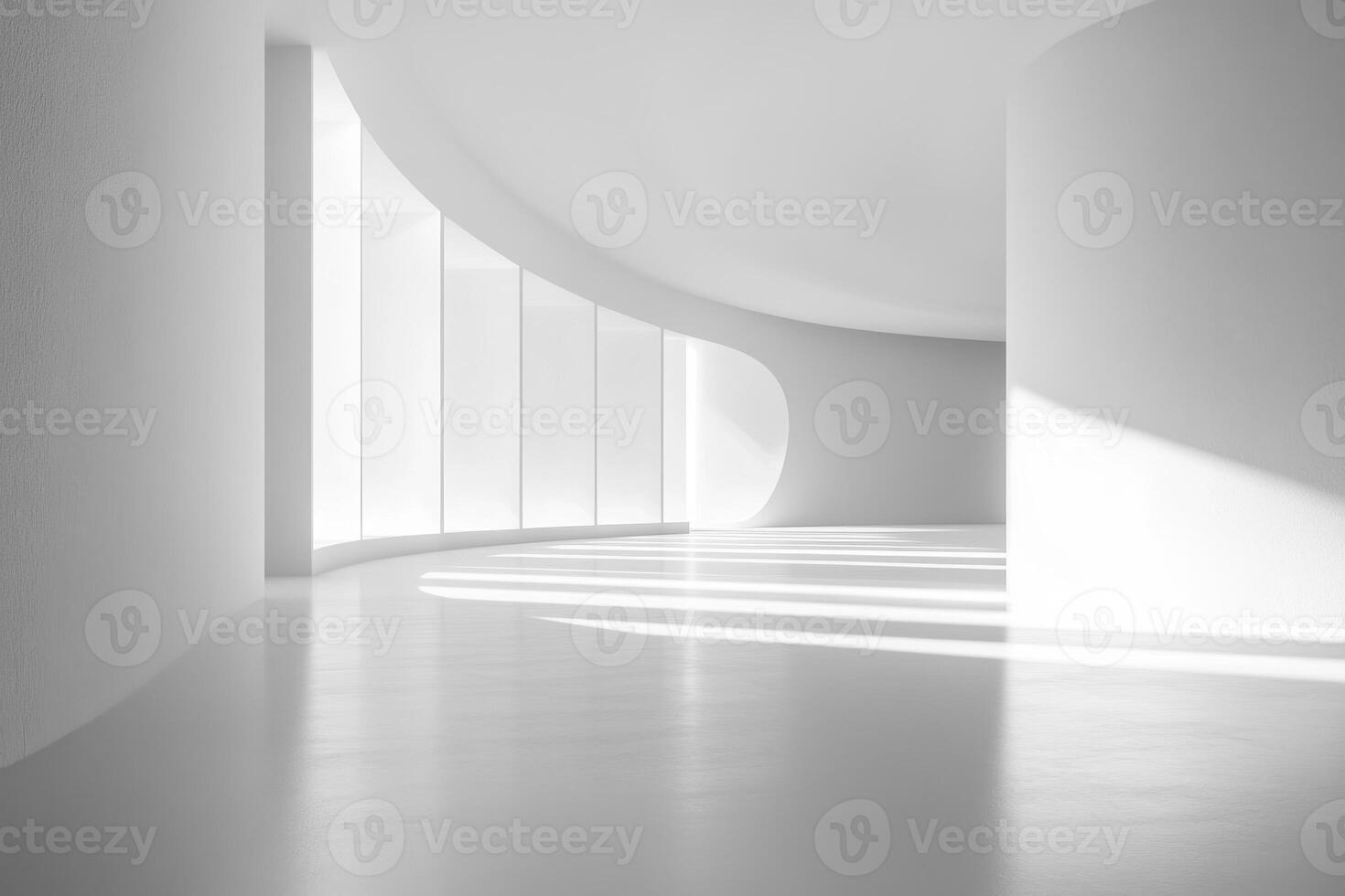 A minimalist interior space with curved walls and large windows allowing natural light. photo