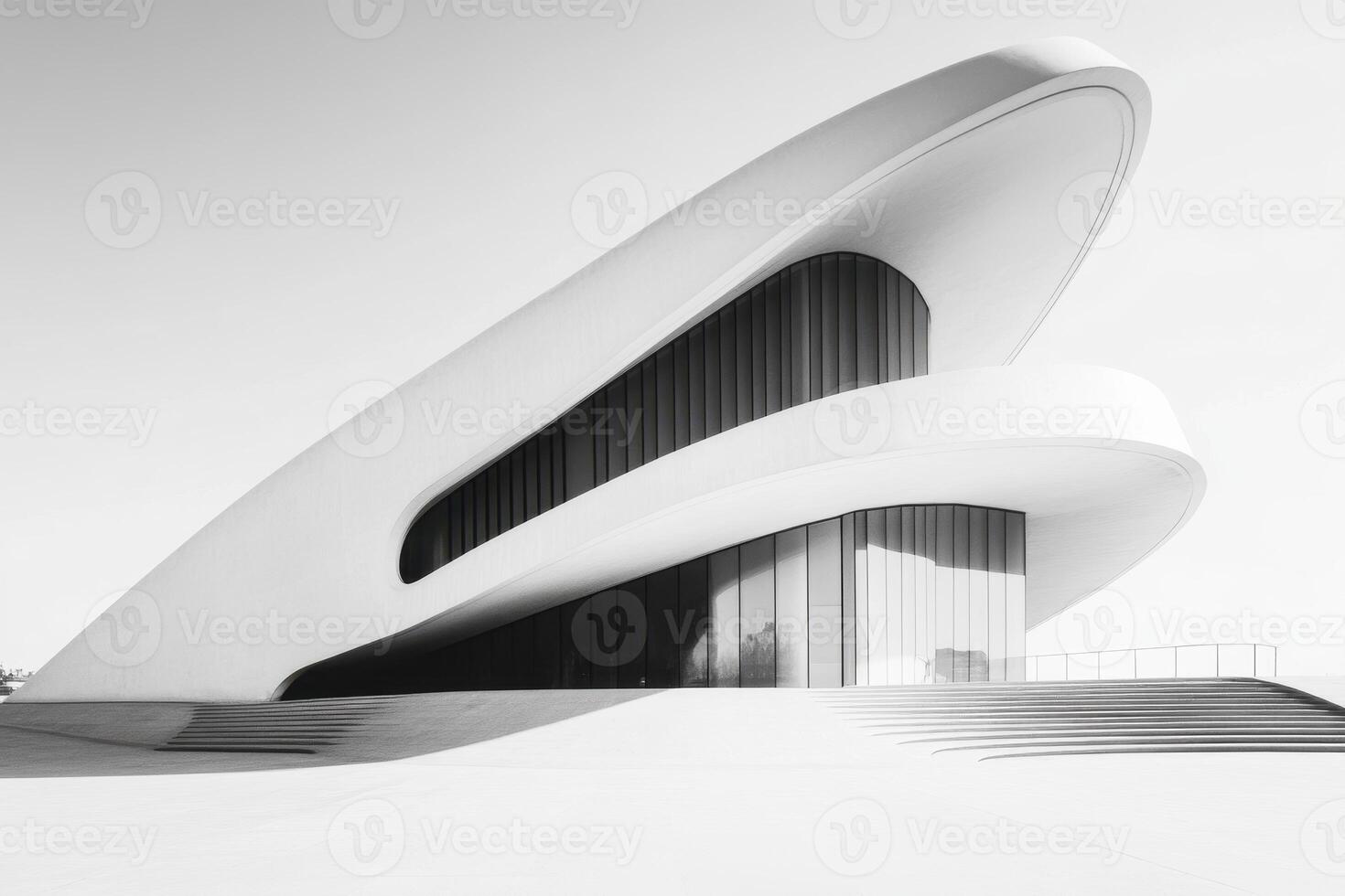 A modern architectural structure featuring sleek lines and a dynamic form. photo