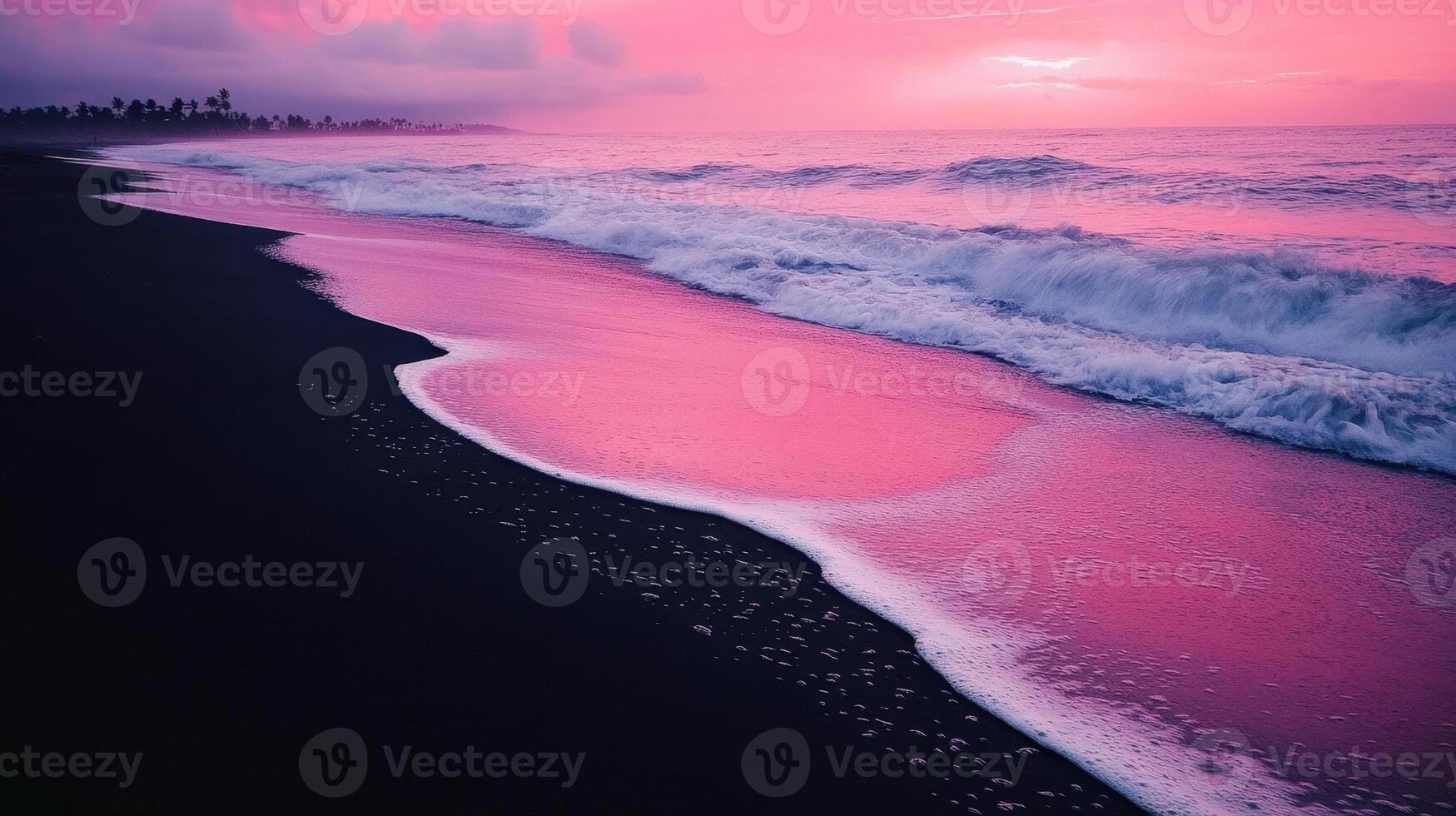 A serene beach at sunset with pink hues reflecting on the waves and dark sand. photo