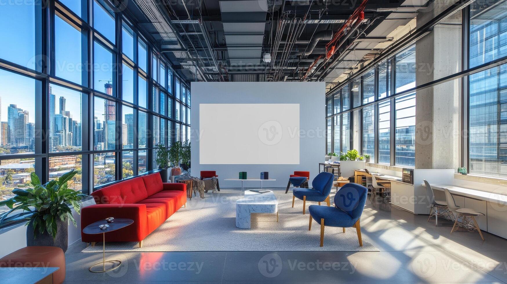 Modern office space with seating, large windows, and a projector screen for presentations. photo