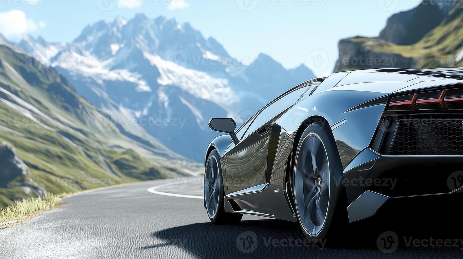 A sleek sports car parked on a winding road with mountains in the background. photo