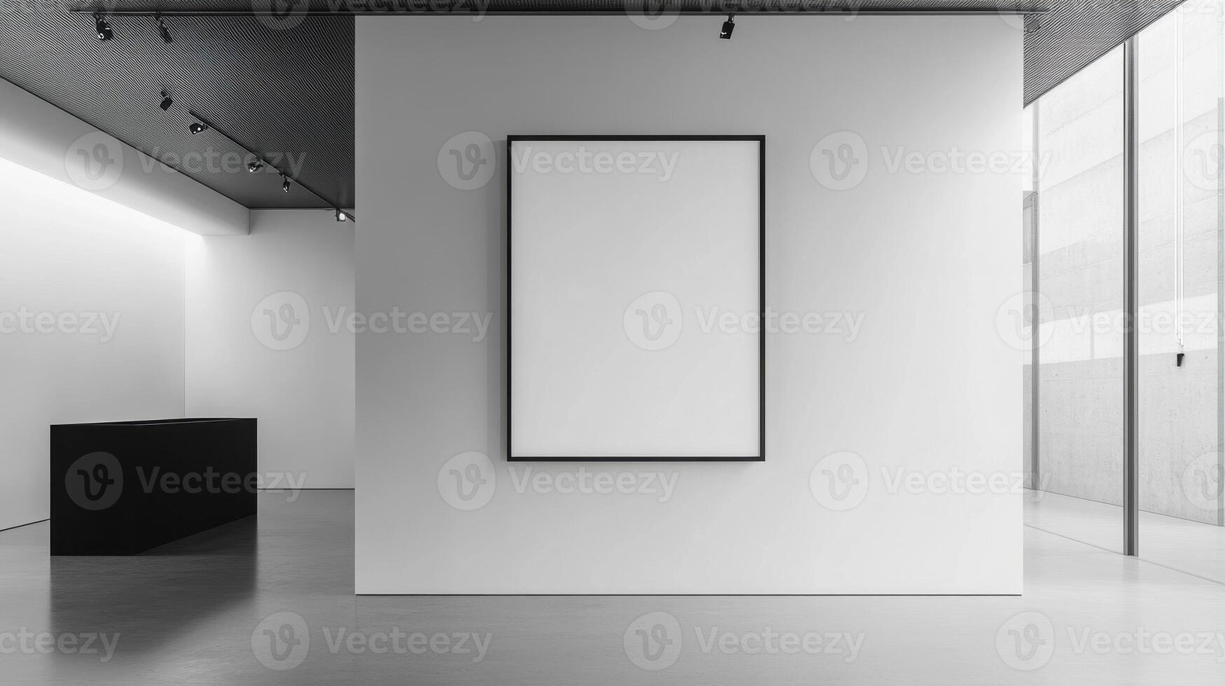 A minimalist gallery space featuring a blank canvas on a white wall. photo