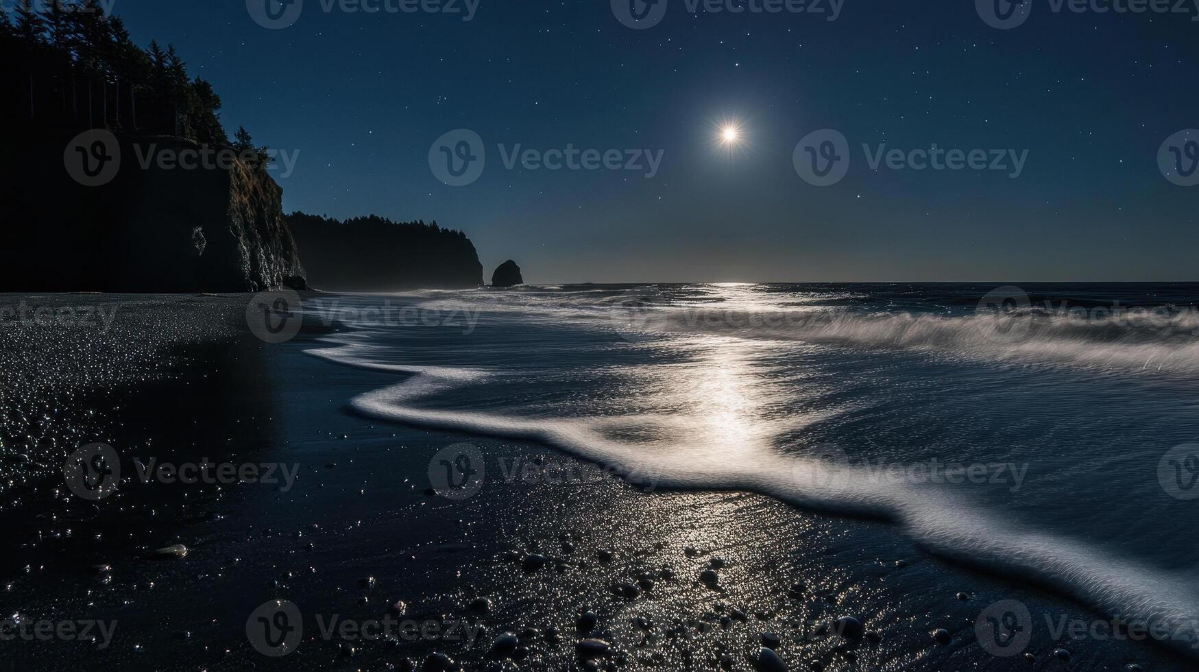 A serene night beach scene illuminated by moonlight, with gentle waves lapping at the shore. photo