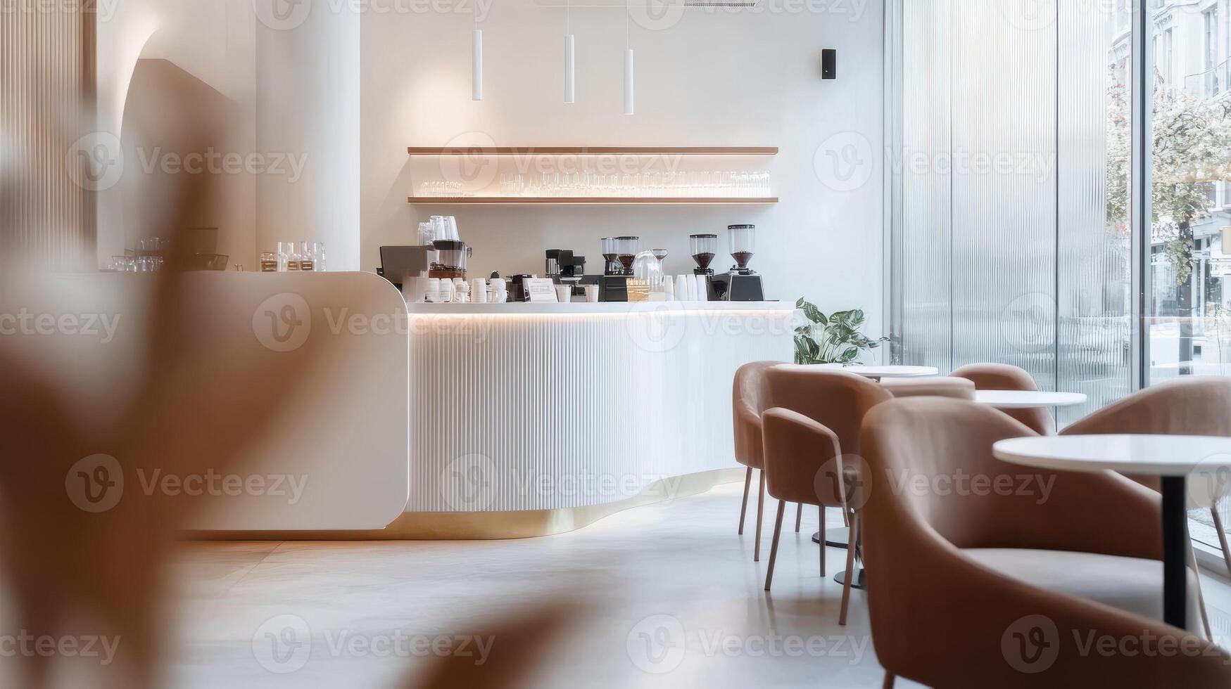 A modern caf interior featuring a sleek counter and comfortable seating photo