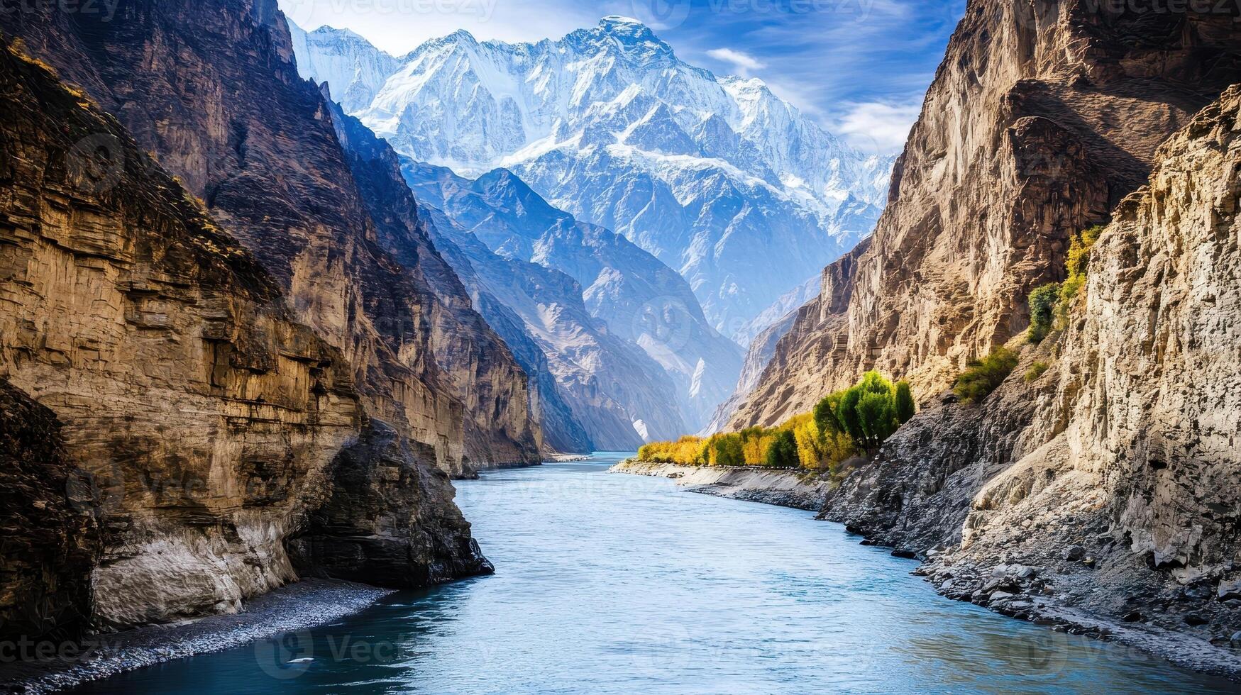 Scenic view of a river winding through majestic mountains and cliffs. photo