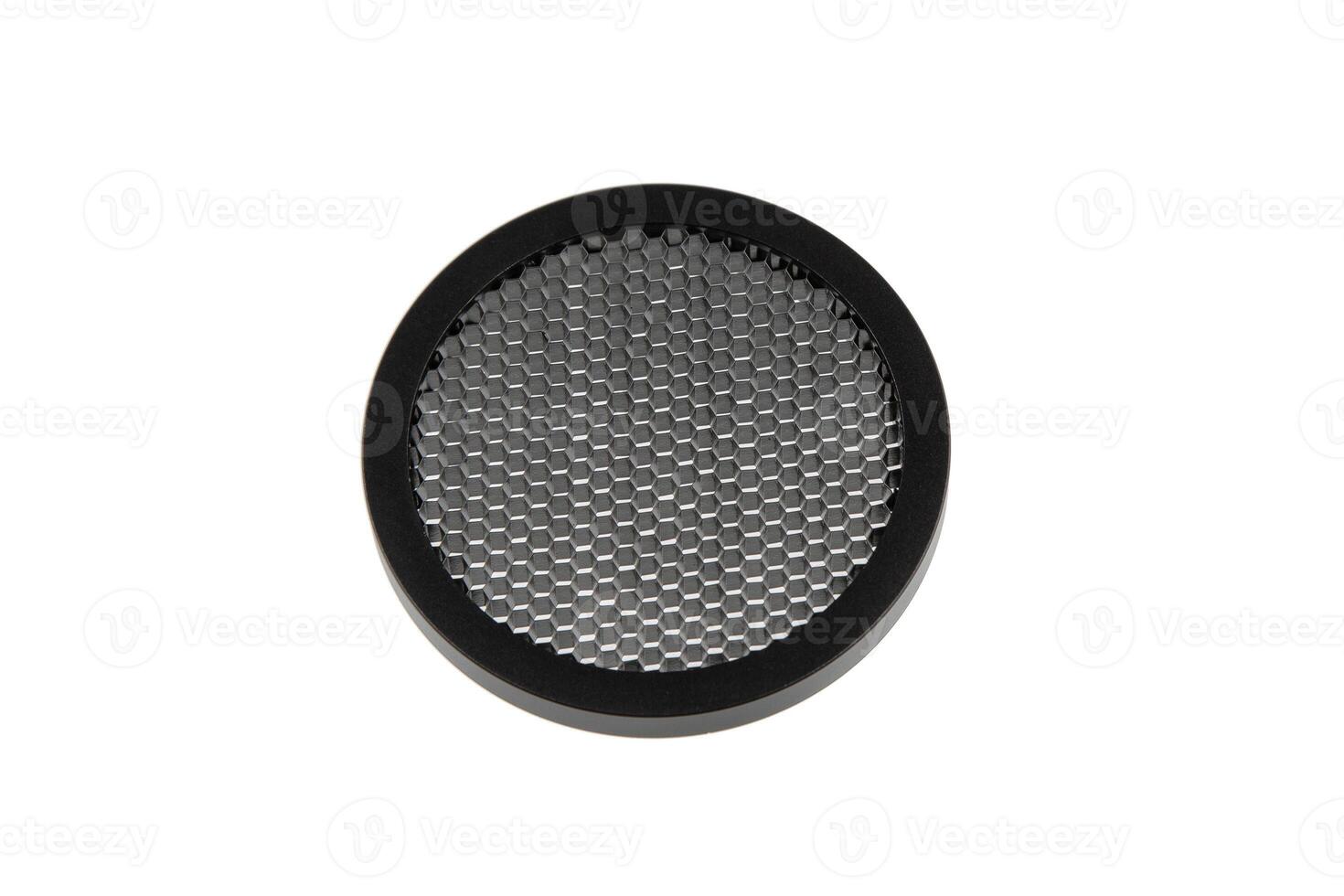 A black killflash scope attachment with a honeycomb mesh design, isolated on a white background. photo