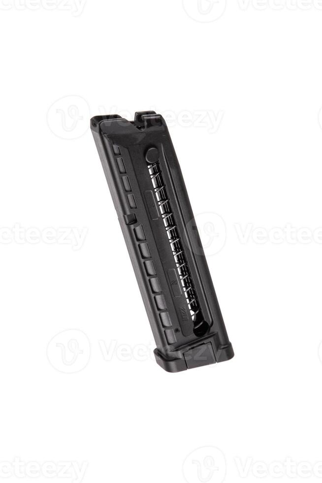 A black .22 LR caliber pistol magazine, featuring a visible spring mechanism and durable construction, isolated on a clean white background. photo
