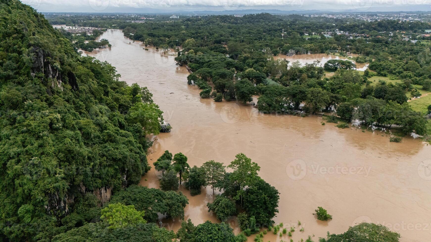 Chiang Rai beach flooding by Kok river after typhoon Yagi has swept Southeast Asia. photo