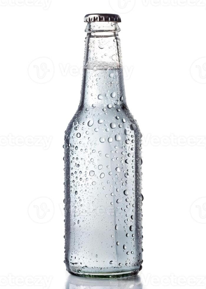 Wet Glass Bottle with Condensation Isolated on White photo