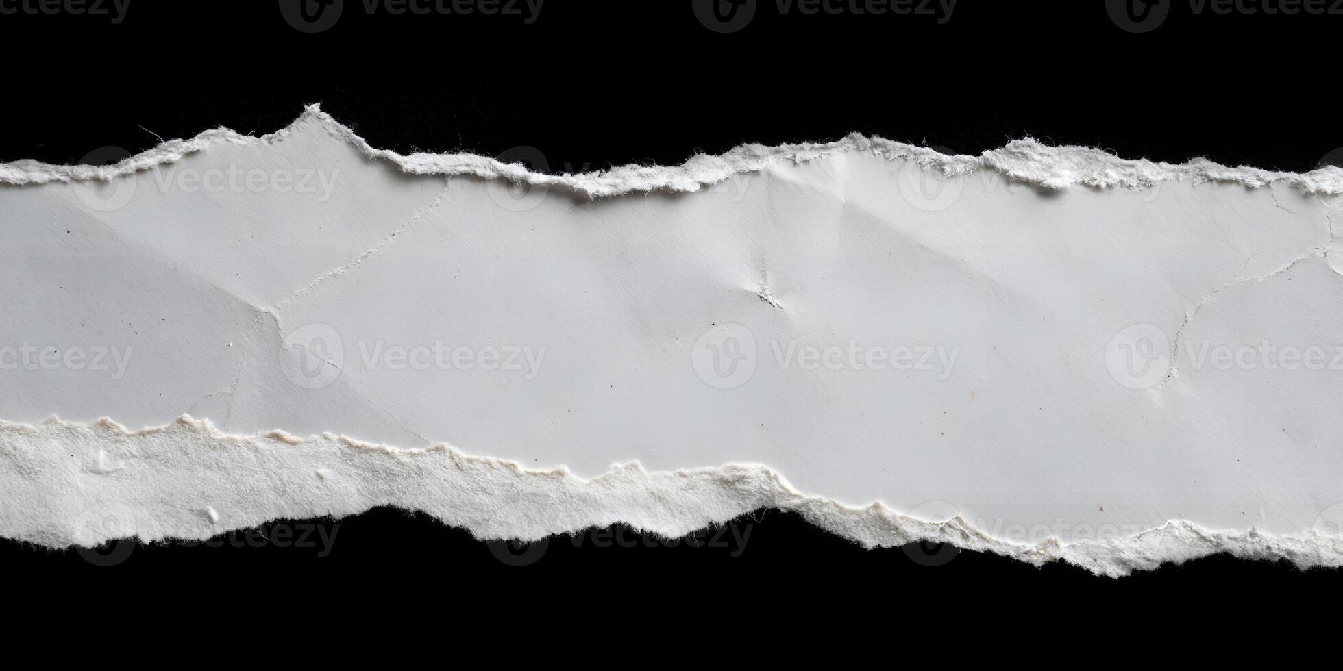 Torn Paper Edge in Center isolated on Black background. photo