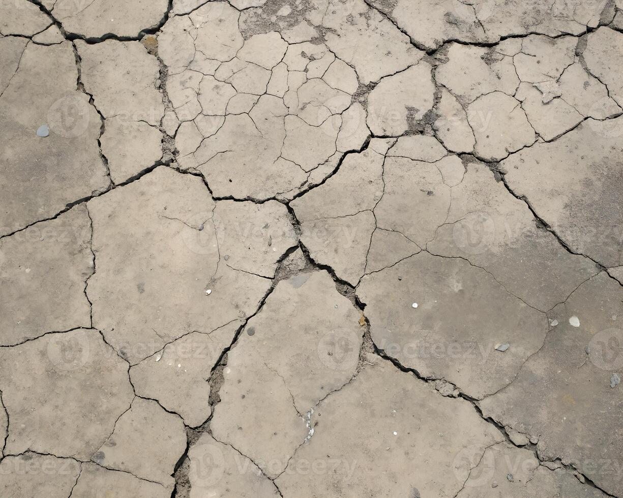 seamless cracked concrete texture top view. photo