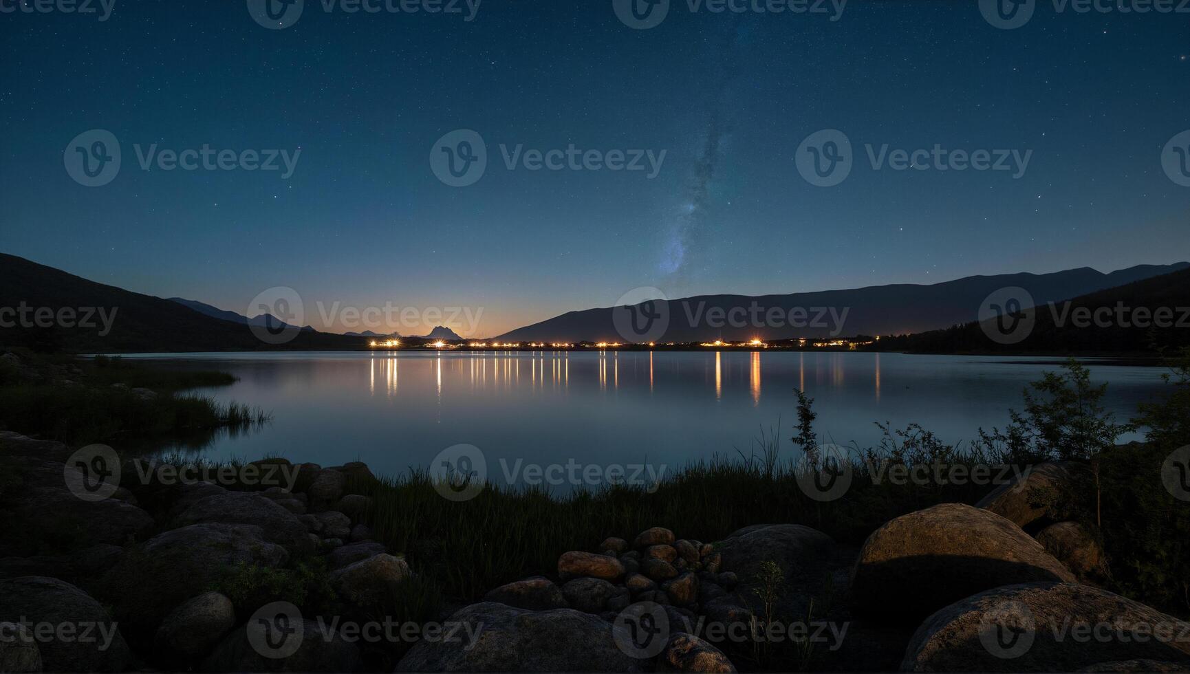 Serene Night Lake with Starry Sky Reflection photo