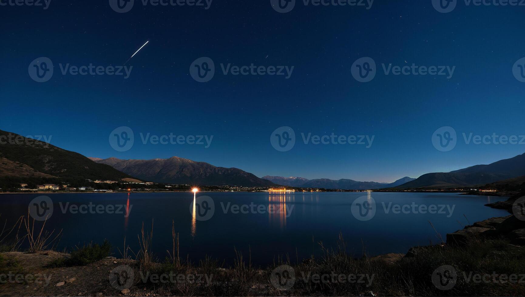 Starry Night Over Serene Mountain Lake photo