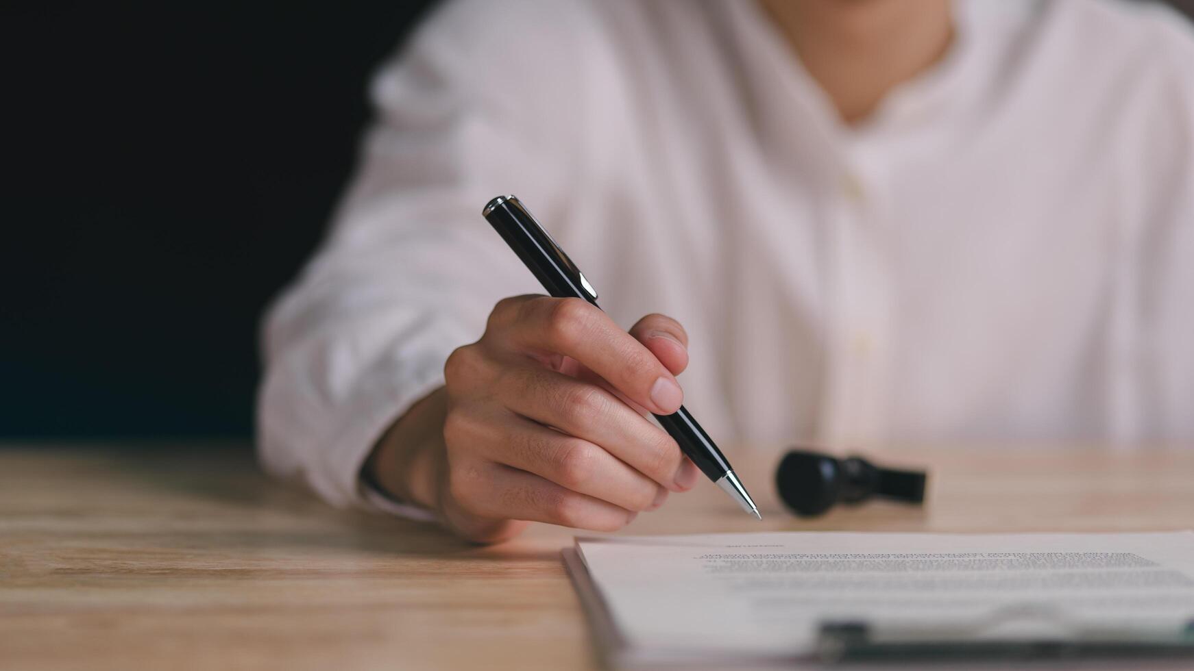Business Agreements and Approvals , business contract signing , guarantee correctness , Signing a form , Business paperwork, Confirmation of contract documents or warranty card , legal contract photo