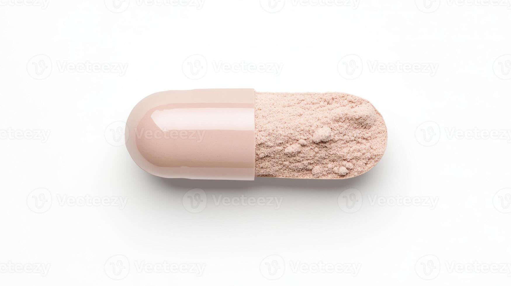 A large beige capsule is opened, with fine light powder spilling out, resting on a clean white surface, illustrating a pharmaceutical preparation photo