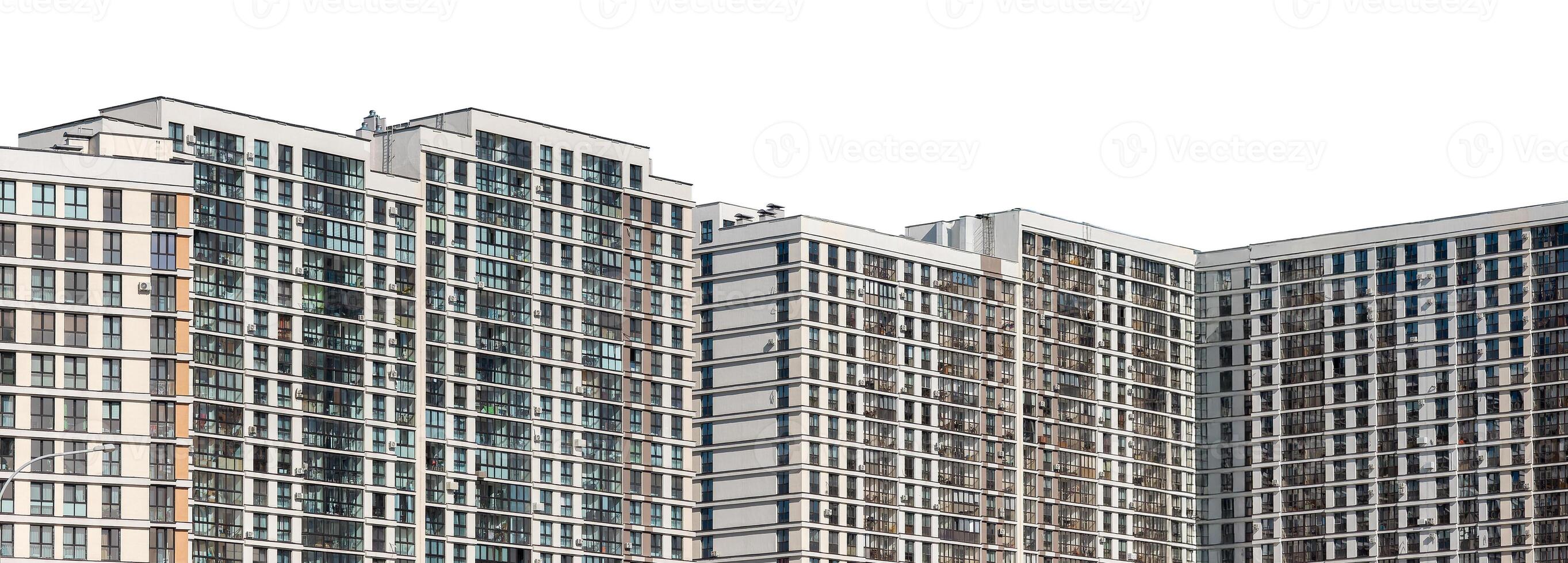 Building with modern design. Tall multistorey highrise condominium with window facade, residential photo