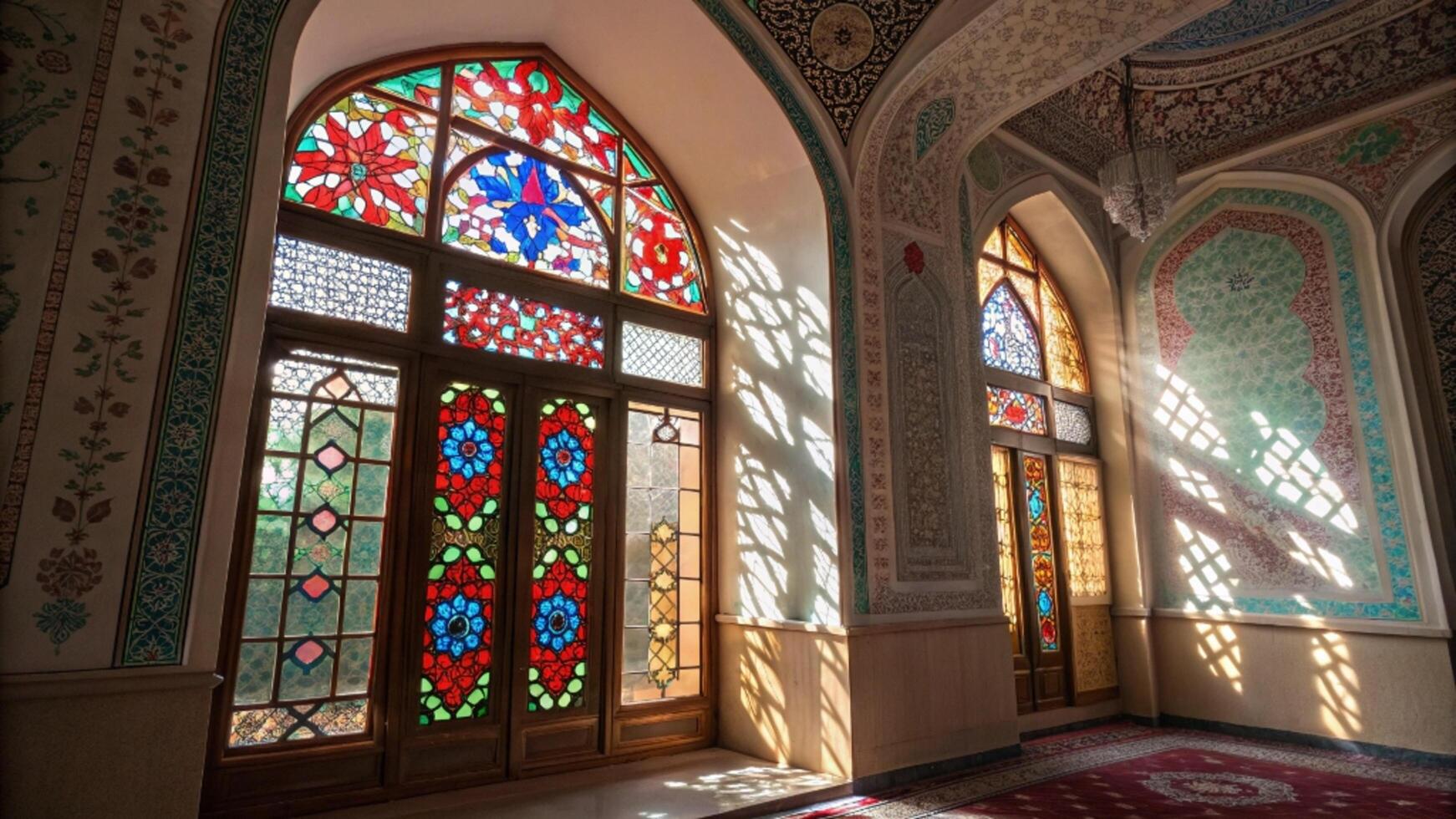 The interior of a building with colorful stained glass windows photo