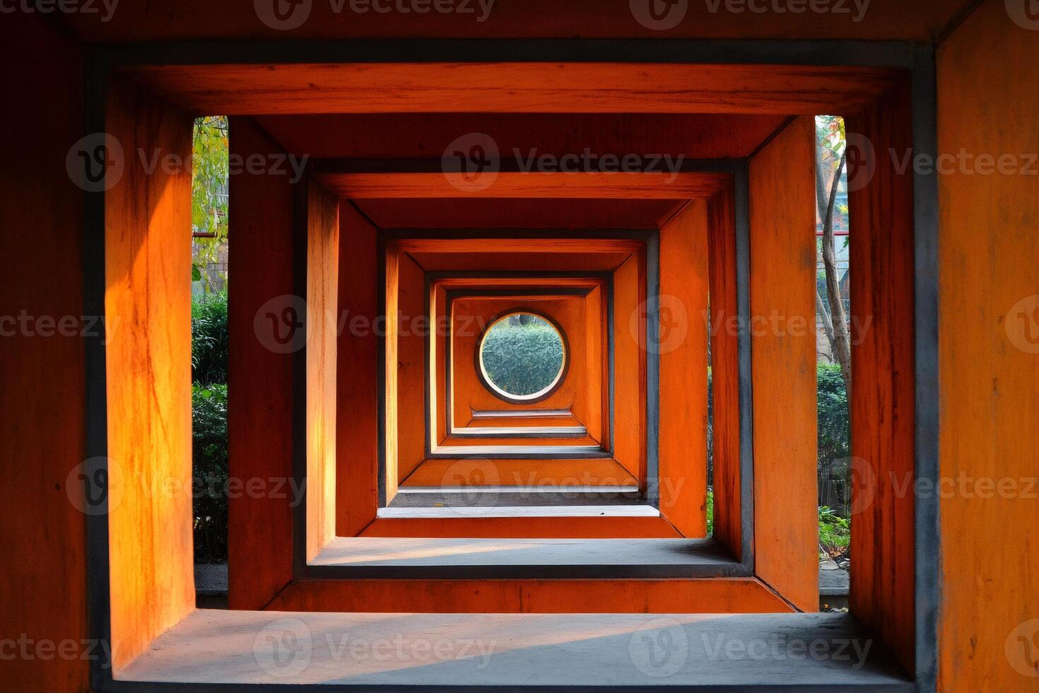 Orange wooden tunnel creating an abstract perspective with a circular opening photo