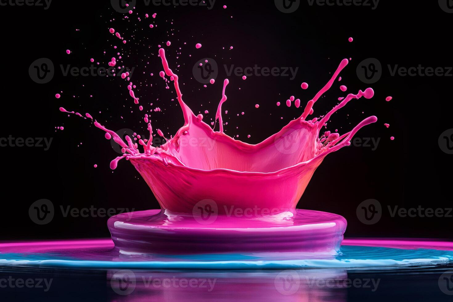 Pink paint splashing and making a crown shape on a colorful surface photo
