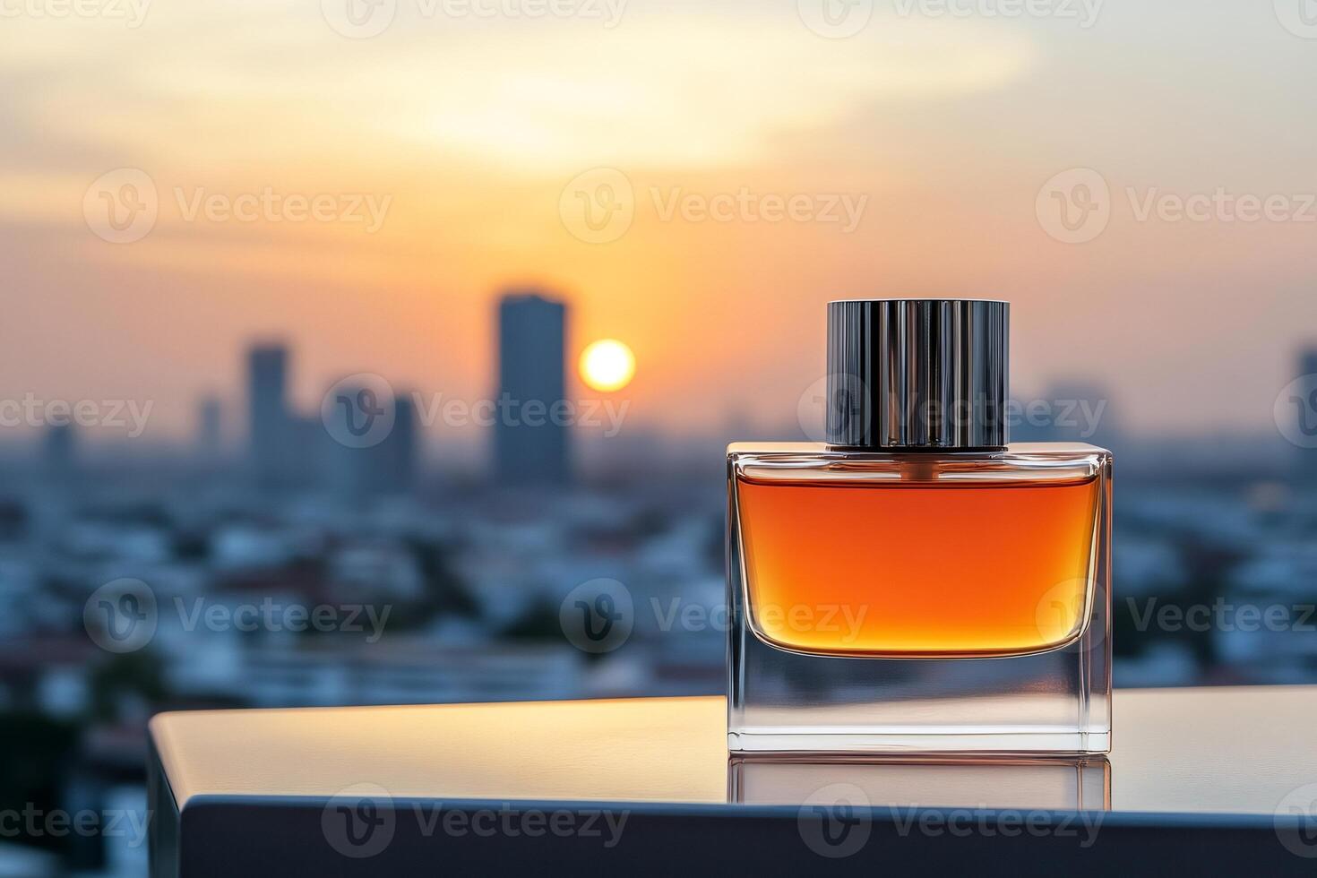Perfume bottle displayed on a rooftop at sunset with city skyline photo